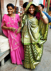 Deogarh, Rajasthan - bride being fitted for her wedding sari