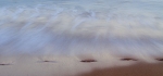 Footprints on the beach , Maui