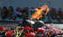 Murmansk Memorial to the Defenders flame and helmets  