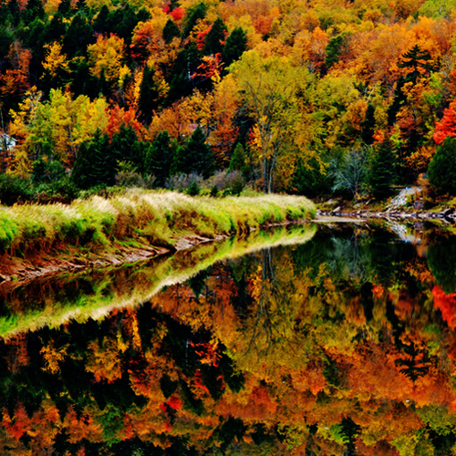 New Brunswick's Hammond River Reflecting Peak Autumn Hues