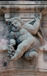 Lower cloister arch keystone, cherub