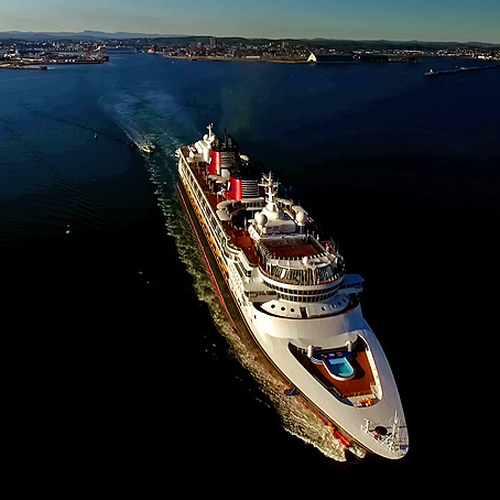 The cruise ship, Disney Magic, makes her way out of Saint John Harbour in New Brunswick, Canada.