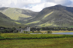 Kilchurn Castle looking idyllic bathed in sunshine.