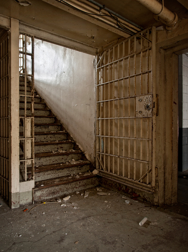 Main stairway in the infirmary ward. Essex County Jail Annex, Caldwell NJ. 2008. Photograph by Matthew Christopher of…