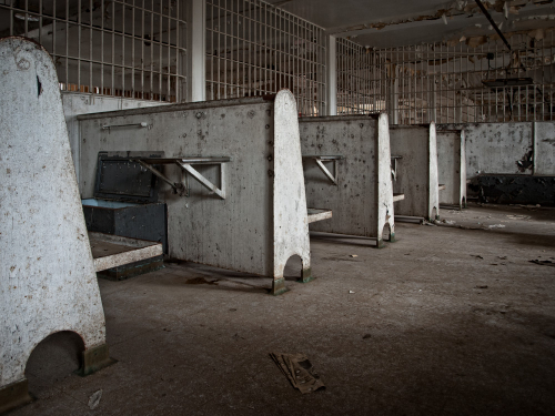 This spartan area is where prisoners spent their time during the day. Three floors are each divided into four identic…