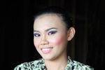 Woman in Traditional dress outside a Longhouse in Sarawak, Borneo_0012