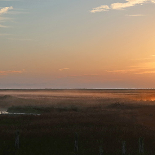 Sunrise over the Fundy Salt Marsh at St. Martins, NB.