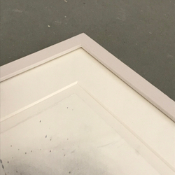 Mounted to show deckled edges