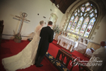 Bride & Groom at ceremony at Wedding at St. Hilary