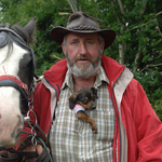 15, Man with pony and dog in his Shirt, The Fair of Muff,  Co.Cavan