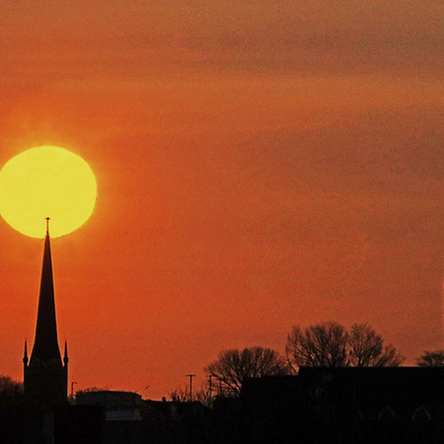 Wildfire smoke from western Canada produces a surreal filtered sunrise in Saint John, New Brunswick with the Stone Ch…