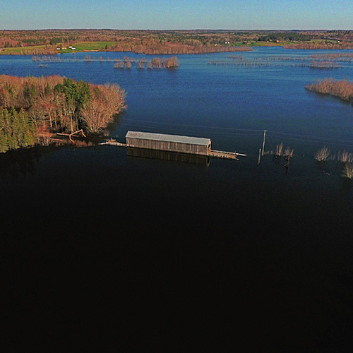 Starkey Covered Bridge in Codys under siege by the Great Spring Flood of 2018 New Brunswick Canada
