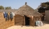 Senegal Fulani Senegal village hut exterior with washing