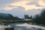 Beautiful sky behind a snowy Kilchurn Castle