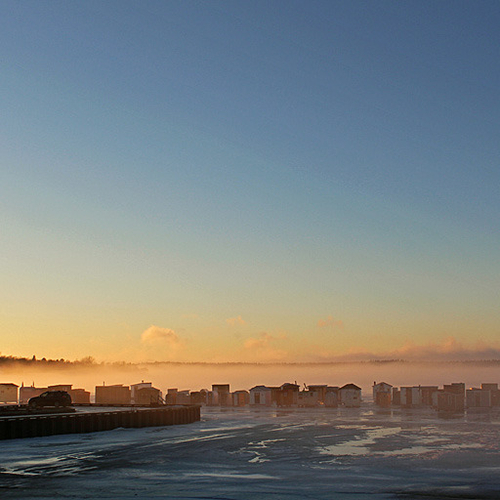 Renforth Ice Fishing Shacks in land fog.