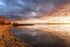 Lake Shore Stormy Sunset
