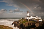 rainbow over lighthouse