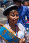 Bolivian dancer in traditional bowler hat