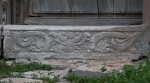 Façade, portal base relief