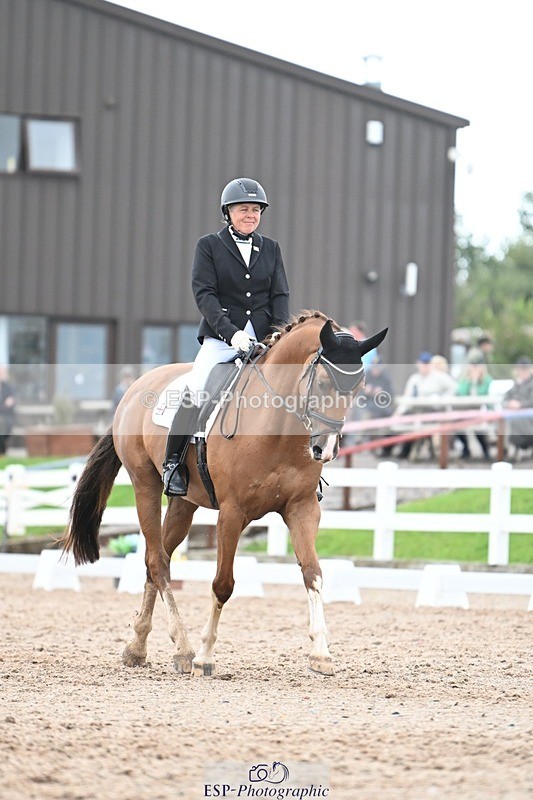 250907-141331-09200 - 007-Karen.DanceHevans.Sign.of.the.Times