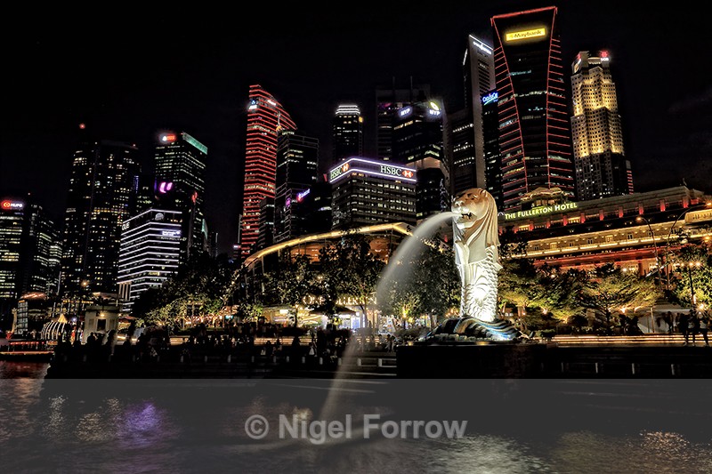 Illuminated Merlion and Singapore Skyline - Singapore