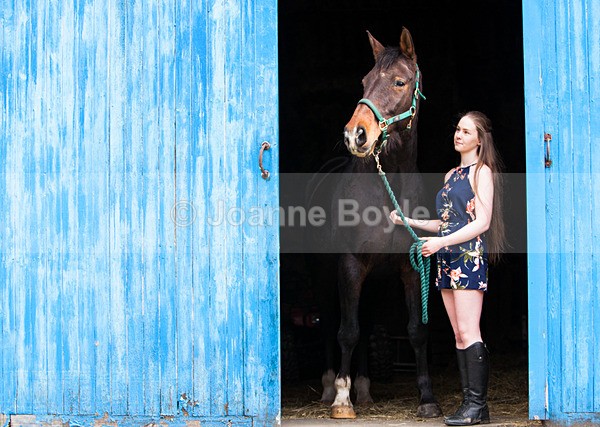 young lady with bay horse in blue doorway - Equine Gallery Portfolio