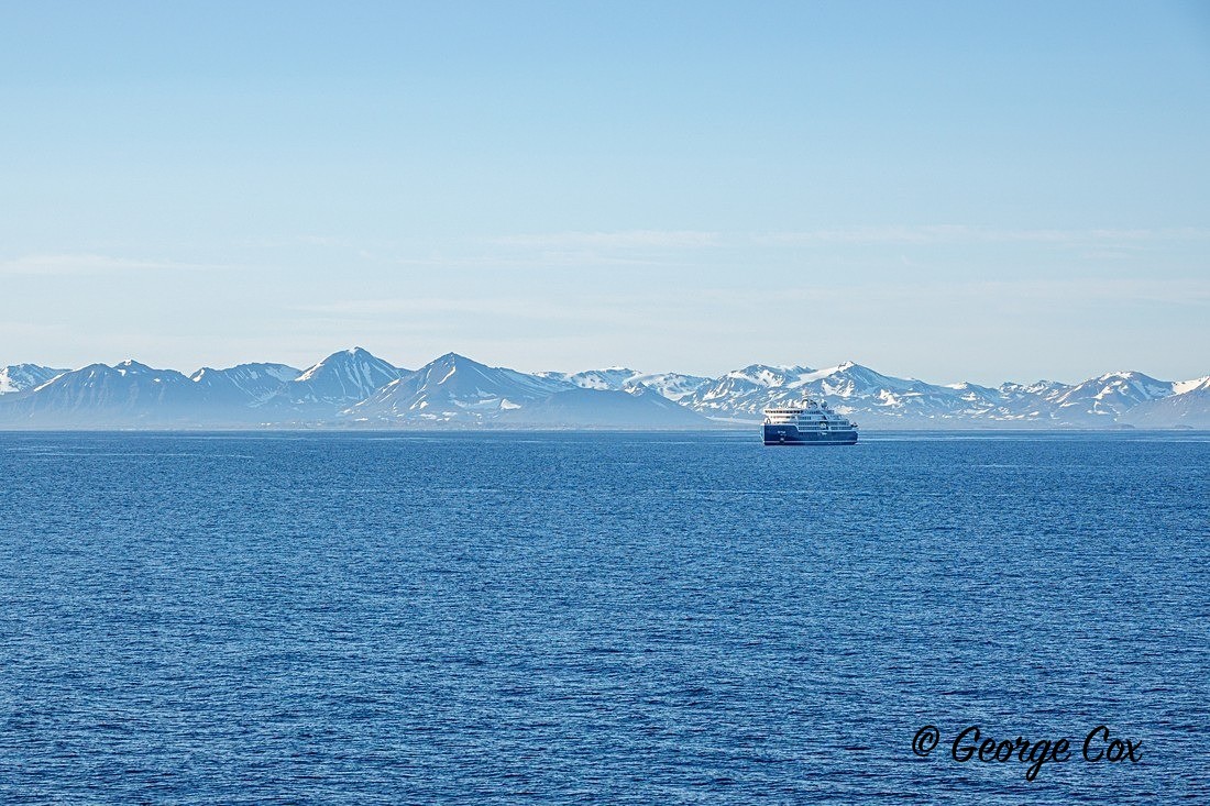 Ship against the mountains - Svalbard - Realm of the Polar Bear