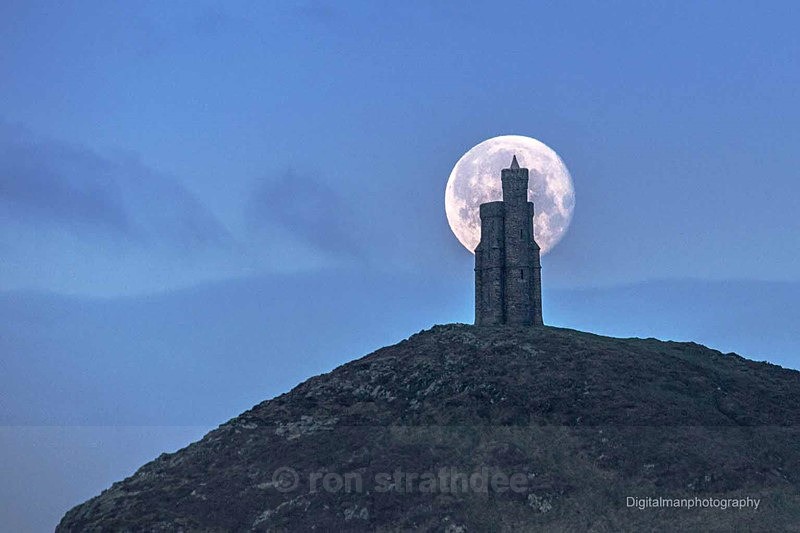 Moon behind Milners Tower - Skies of Man