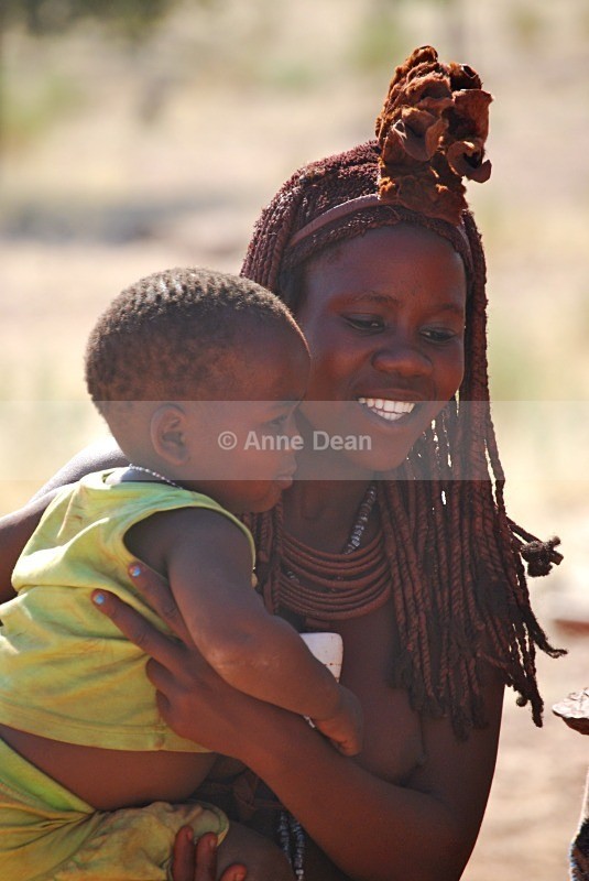 Himba tribe girl and baby, Namibia - Namibia