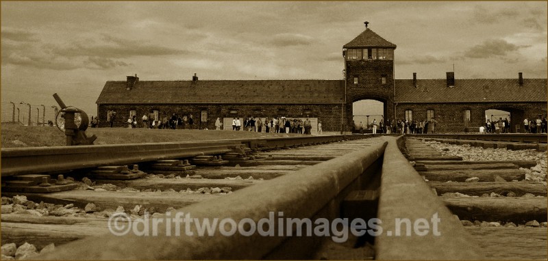 Birkenau  railway lines and entrance tower sepia - Auschwitz/Birkenau