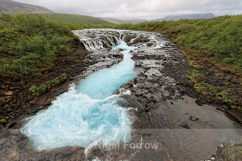 Blue waters of Bruarfoss waterfall, Iceland - Iceland