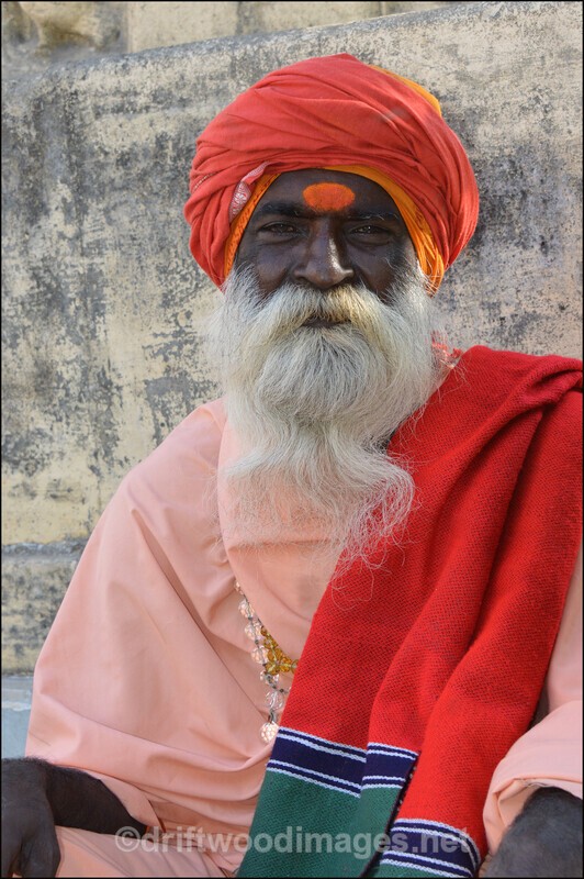 India Porbandar holy man in park sitting - India