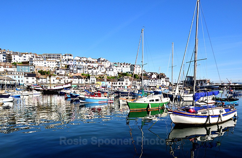 Colourful reflections at Brixham Harbour