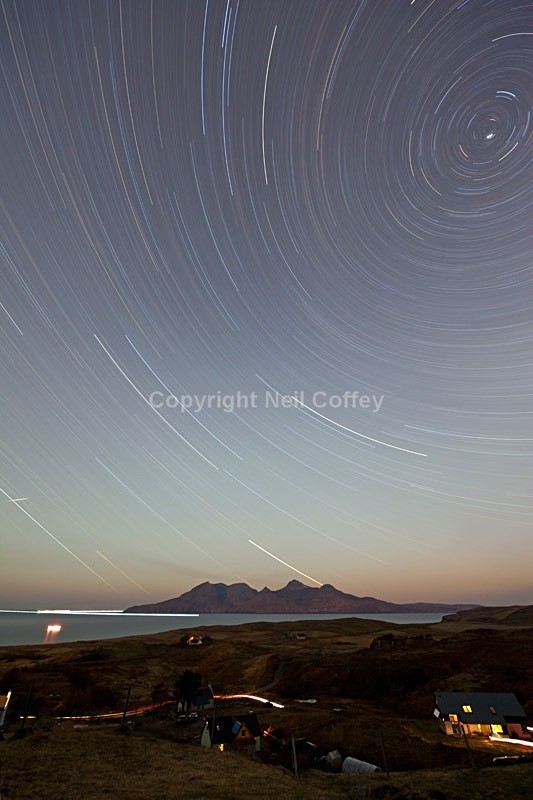 Star trails over Rum from Cleadale, Isle Of Eigg - Portrait format