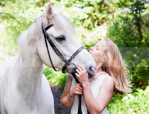 girl-and-pony-in-trees - Equine Gallery Portfolio