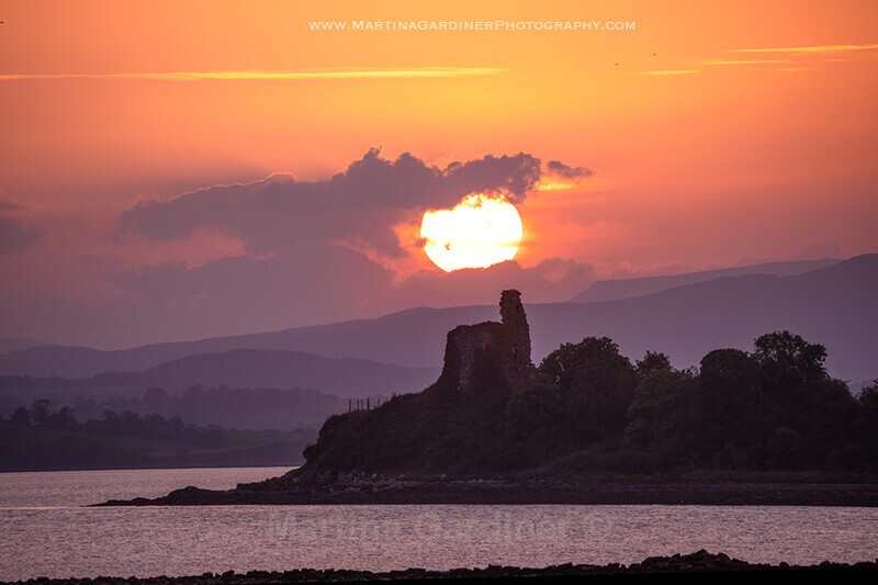Inch Castle Sunset with Sahara Dust - Ireland by Day