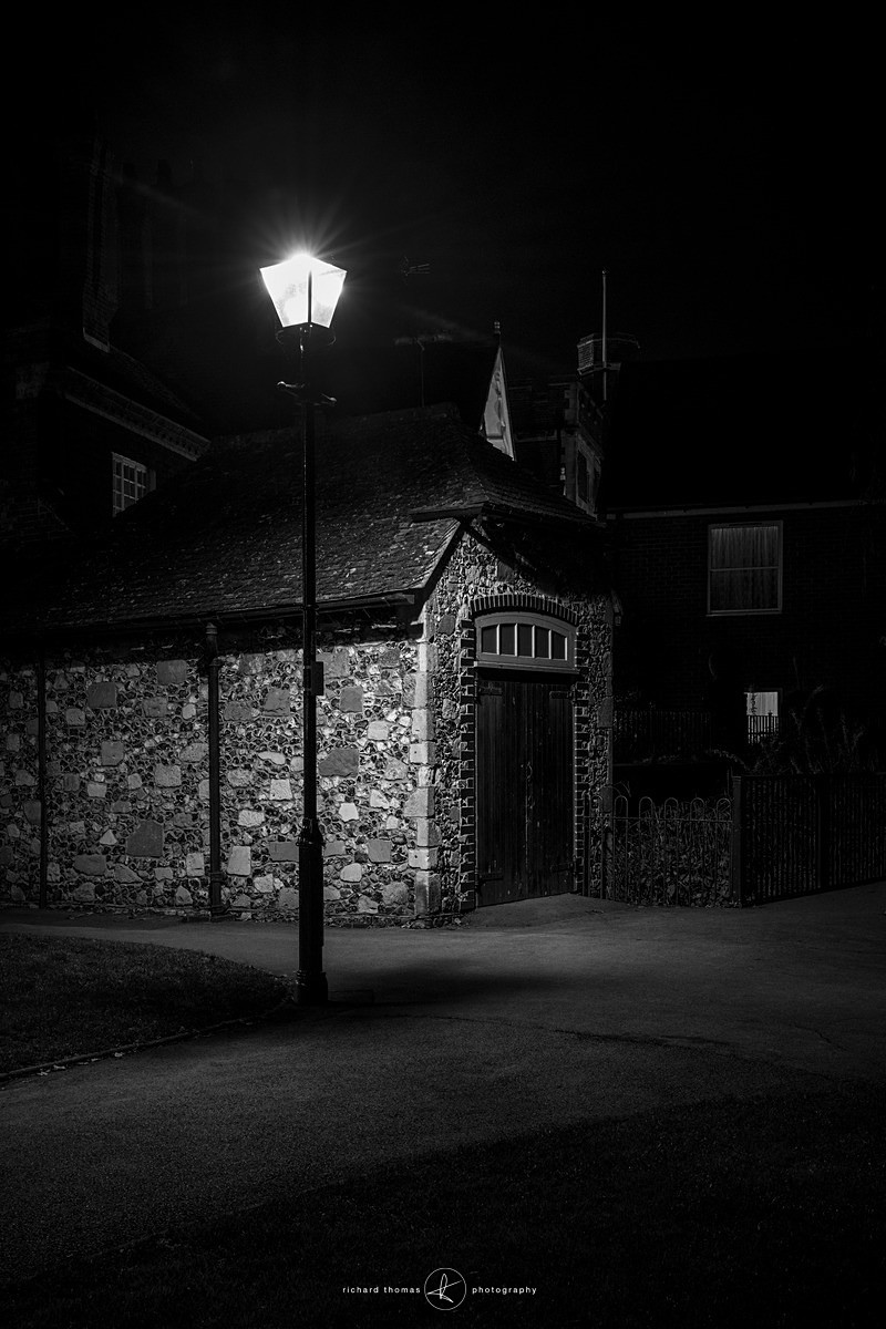 An old flint building in a Winchester park
