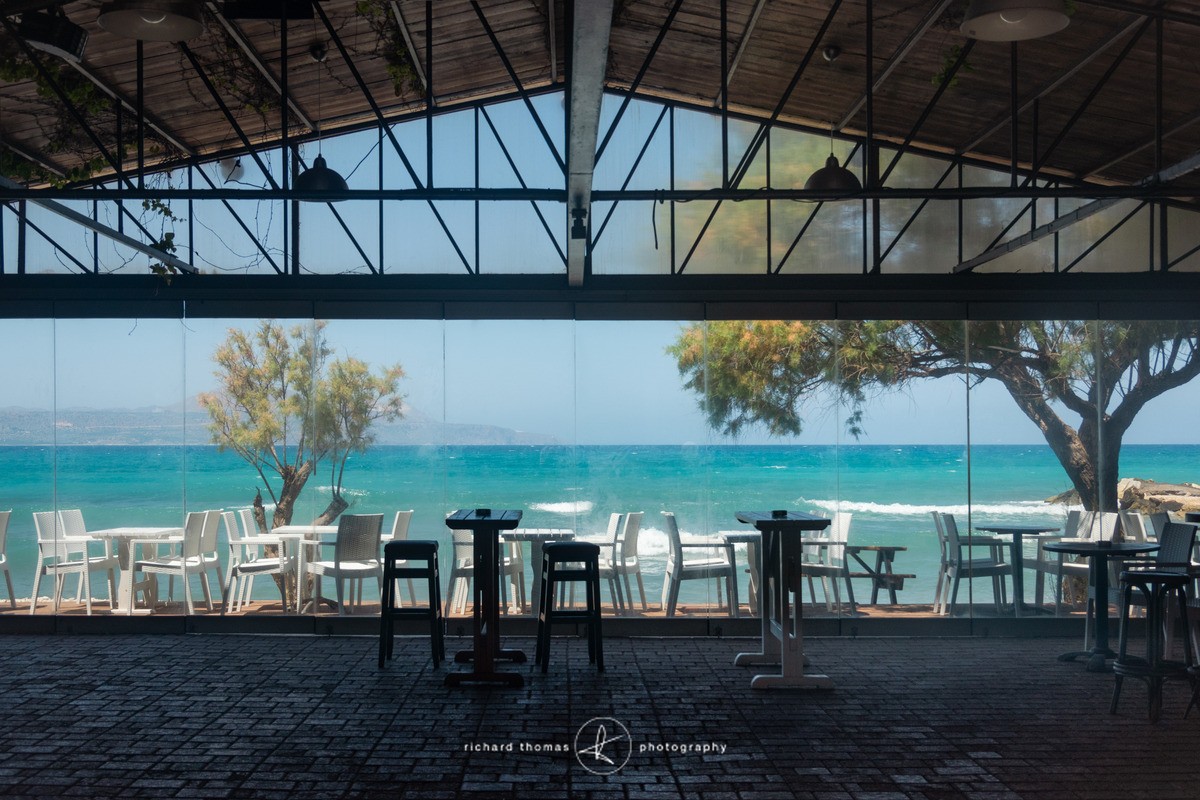 Empty chairs at empty tables - Crete