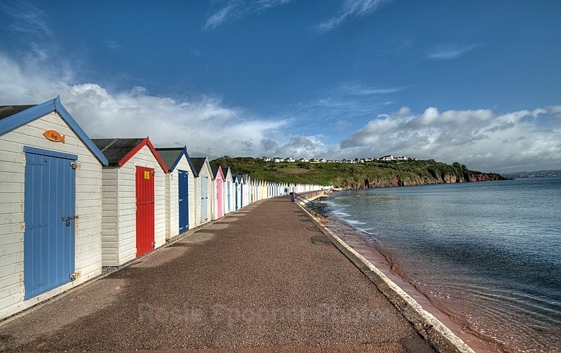 Clouds gather over the Beach Huts at Broadsands - Brixham and Broadsands