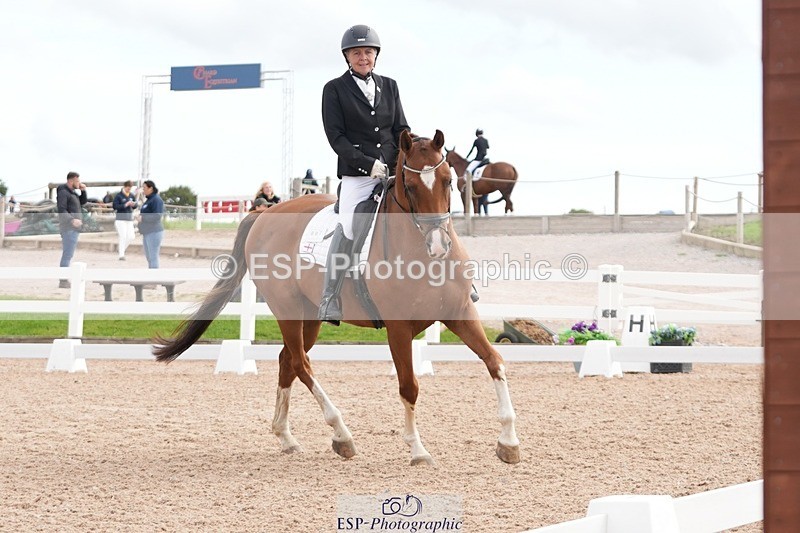 250906-112114-01600 - 007-Karen.DanceHevans.Sign.of.the.Times