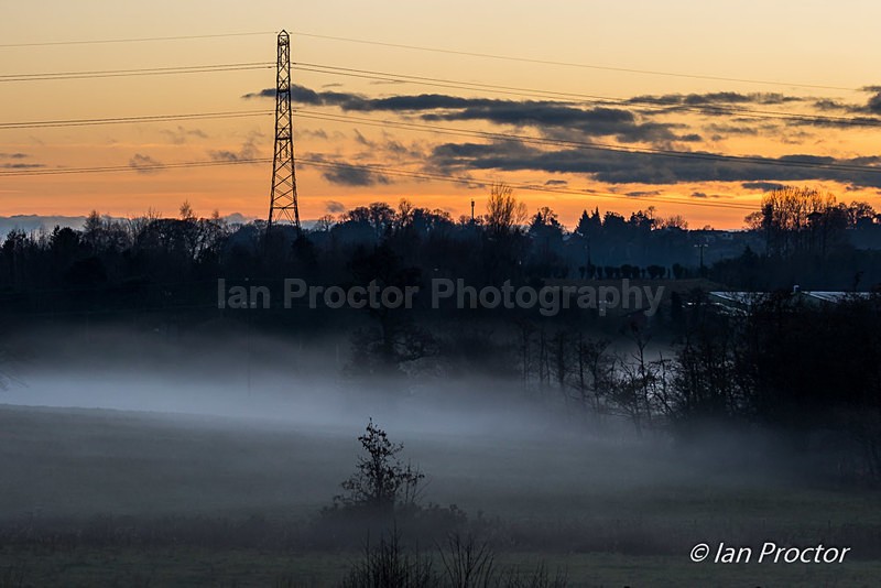 Mist below the pylon at sunset - Nature