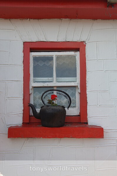 Kettle on Ledge of old cottage window 2, Ireland - Ireland