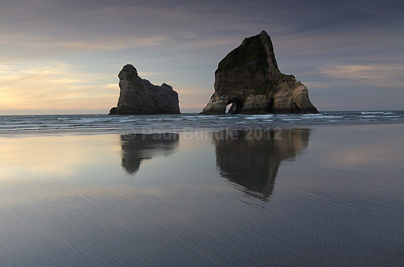 Wharariki Beach reflections - New Zealand South Island