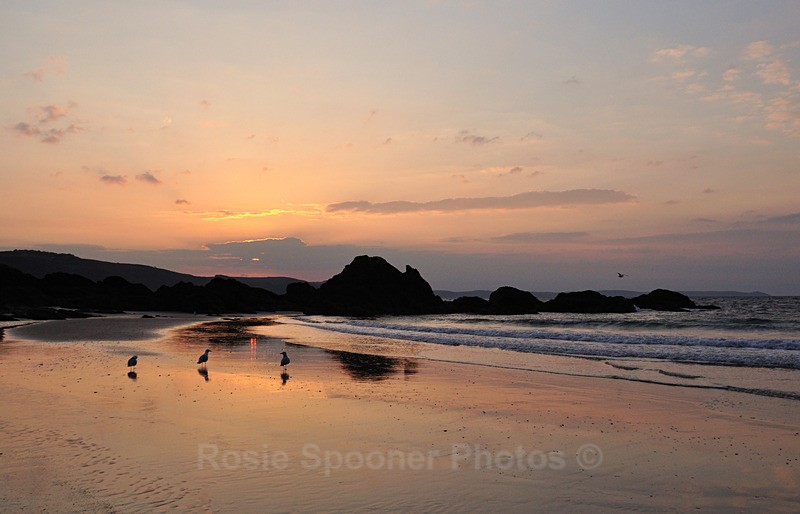 Low tide sunrise on Looe Beach