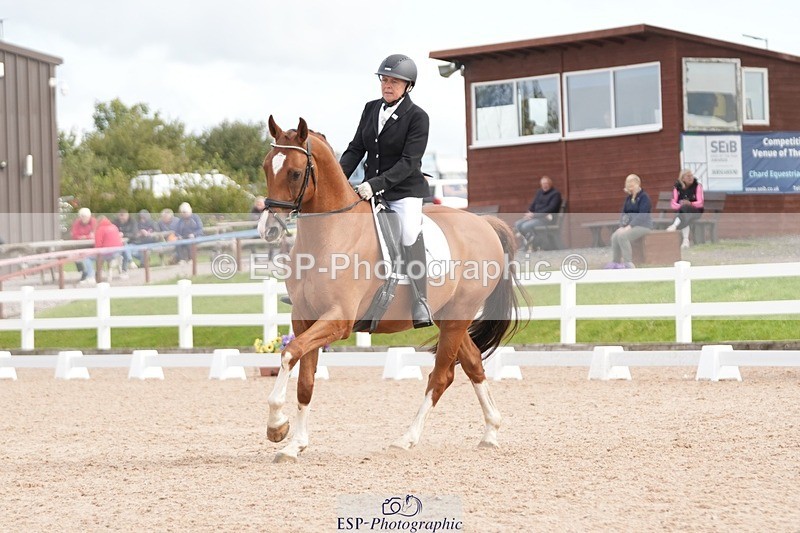 250906-112419-01623 - 007-Karen.DanceHevans.Sign.of.the.Times