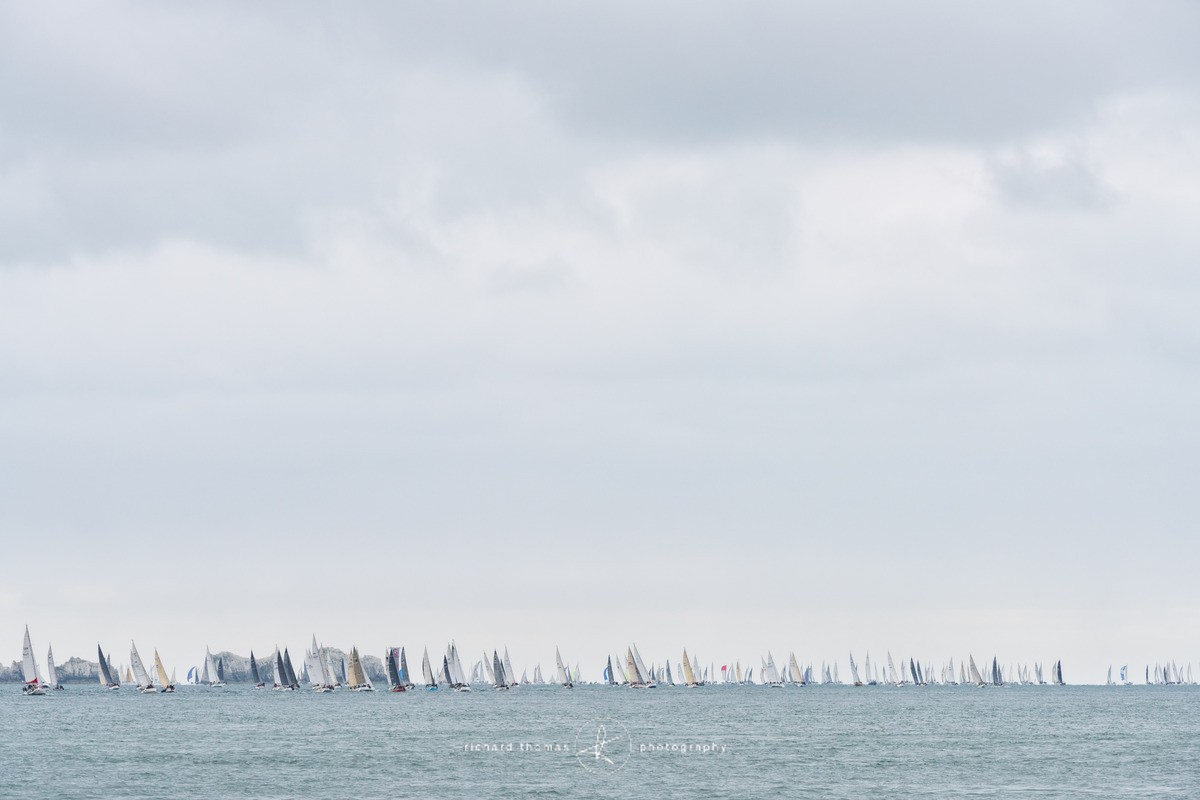 Yachts racing in the Round the Island race 2017 sailing around the Isle of Wight at The Needles