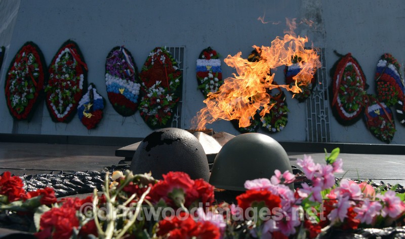 Murmansk Memorial to the Defenders flame and helmets   - Murmansk, Russia