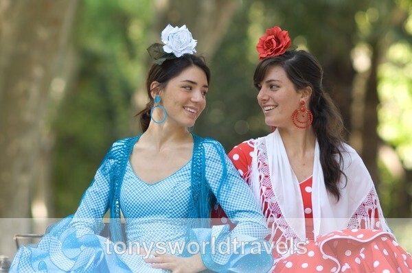 Two Smiling Ladys in Andalusian dress - Smiling faces of the World