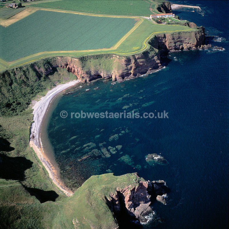 aerial pictures of Scotland east coast coastline by Auchmithie coastal village