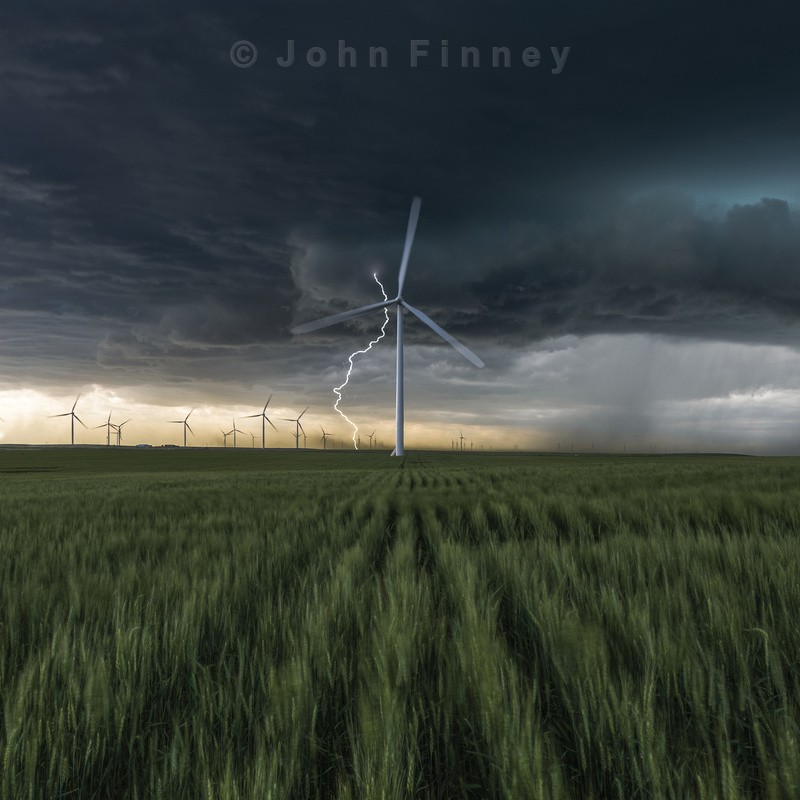Lightning Bolt over a wind farm - Weather photography